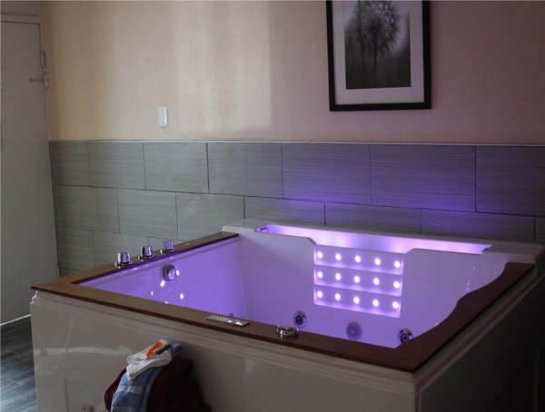 Our new Executive Jacuzzi suites feature a large 80-gallon Jacuzzi tub LED lighting, waterfall and bluetooth for radio or your device's playlist.